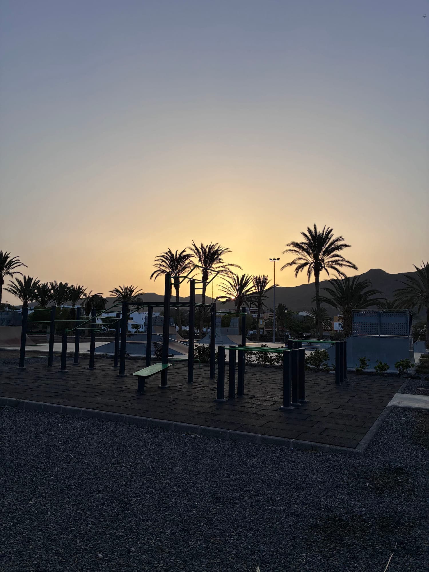 Outdoor gym at sunset by the beach