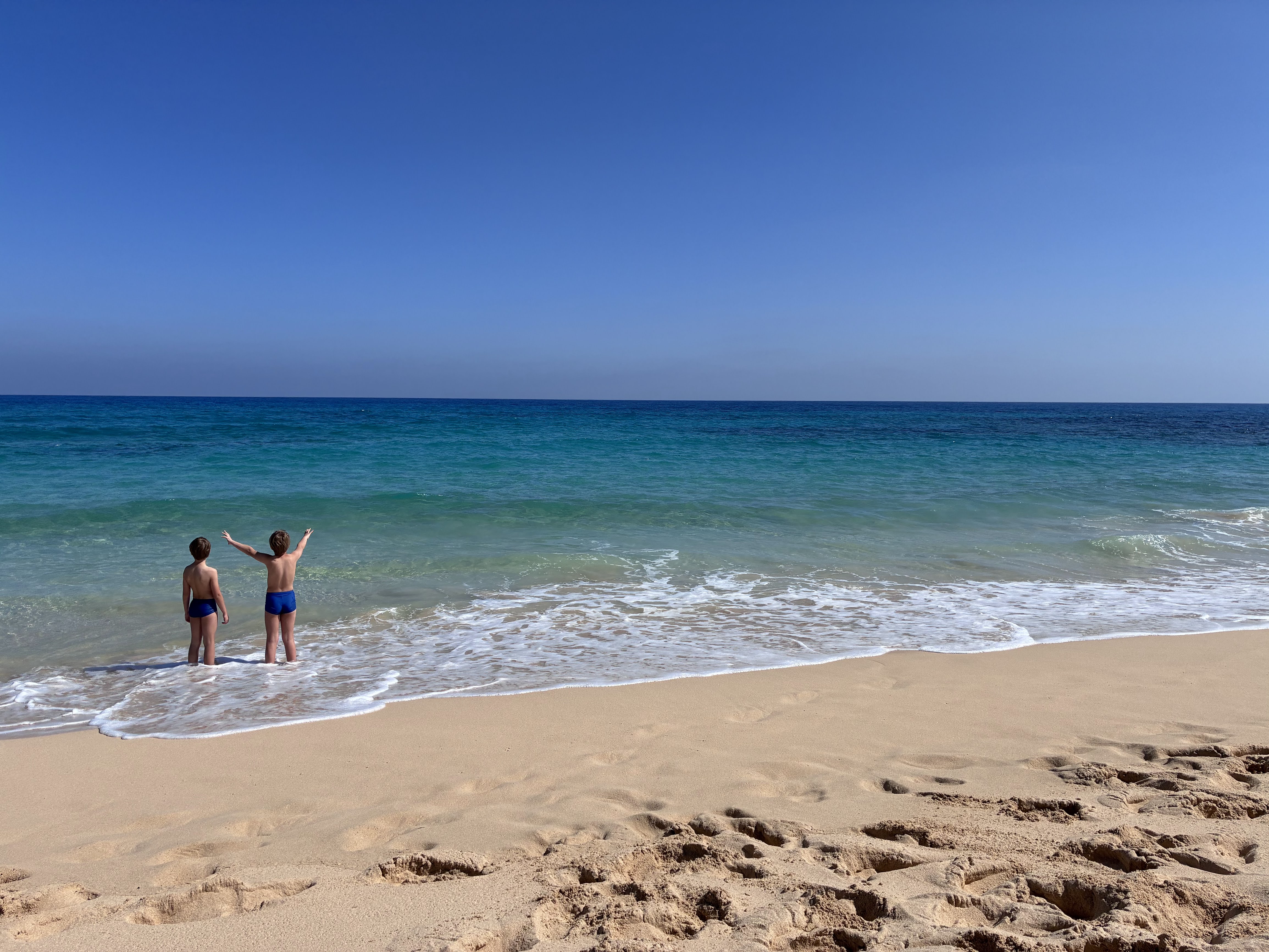 Kids enjoying turquoise waters